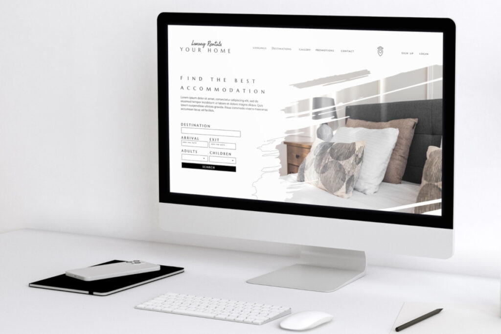 T: Minimalistyczny projekt strony internetowej wyświetlony na monitorze komputera.